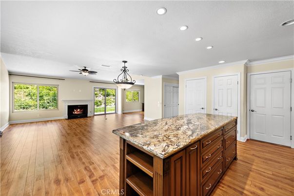 Empty room, Fireplace, Interior, Pendant Lights, Recessed Lighting, Wood Texture Flooring