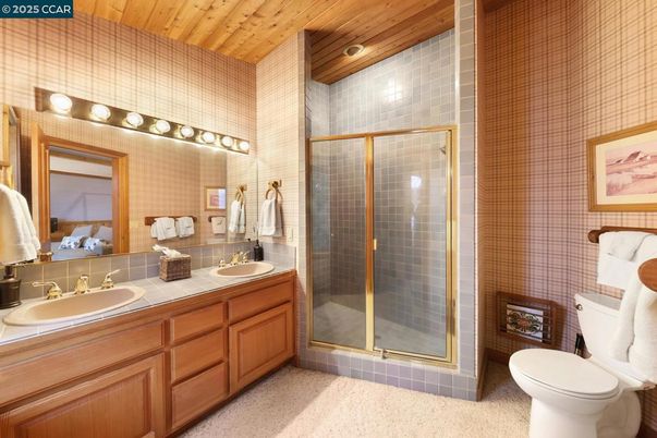 Bathroom, Dual Sink Vanities, Glass Shower, Interior, Recessed Lighting, Tile Countertops, Wooden Ceilings