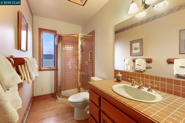 Bathroom, Glass Shower, Interior, Tile Countertops, Wood Texture Flooring