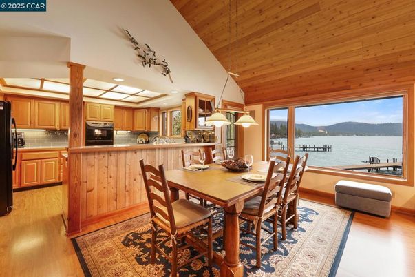 Dining room, Interior, Kitchen, Pendant Lights, Recessed Lighting, Water, Wooden Ceilings, Wood Texture Flooring