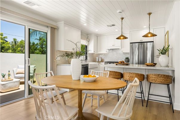 Dining room, Interior, Kitchen, Pendant Lights, Recessed Lighting, Stainless Steel Appliances, Wood Texture Flooring