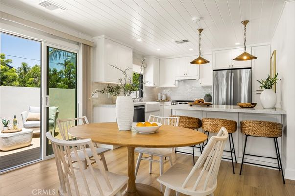 Dining room, Interior, Kitchen, Pendant Lights, Recessed Lighting, Stainless Steel Appliances, Wood Texture Flooring