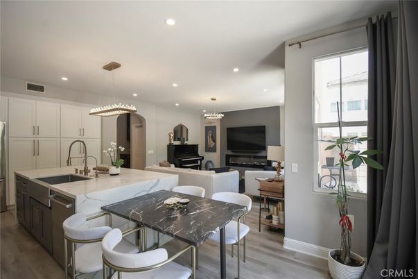 Dining room, Interior, Kitchen, Living room, Pendant Lights, Piano, Recessed Lighting, Wood Texture Flooring