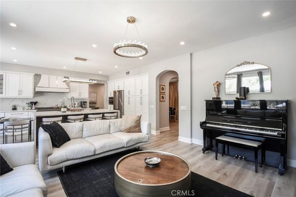 Interior, Kitchen, Living room, Pendant Lights, Piano, Recessed Lighting, Stainless Steel Appliances, Wood Texture Flooring
