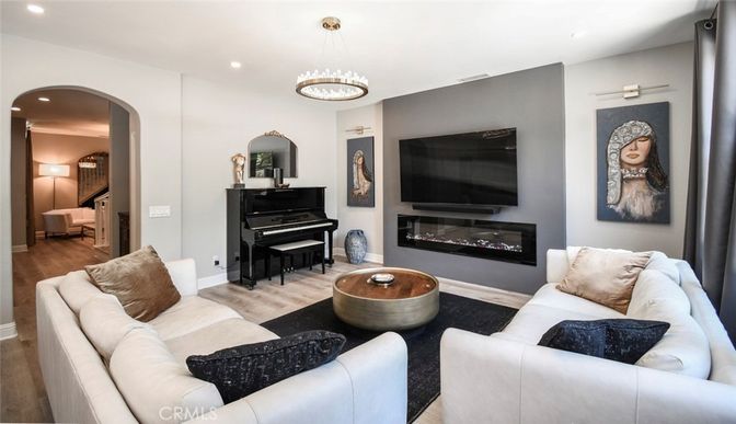 Fireplace, Interior, Living room, Pendant Lights, Piano, Recessed Lighting, Wood Texture Flooring