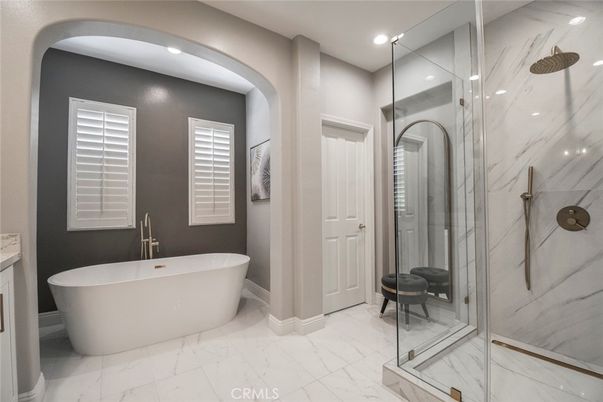 Bathroom, Free Standing Baths, Glass Shower, Interior, Marble, Marble Walls, Recessed Lighting