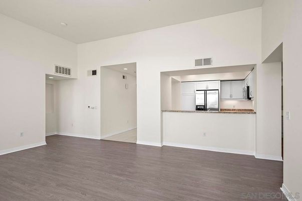 Empty room, Interior, Kitchen, Stainless Steel Appliances, Wood Texture Flooring