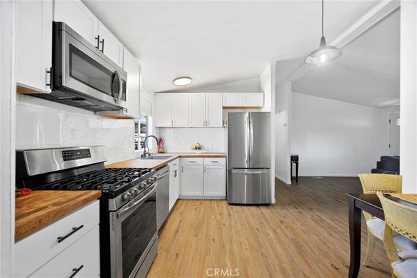 Interior, Kitchen, Pendant Lights, Stainless Steel Appliances, Wood Texture Flooring