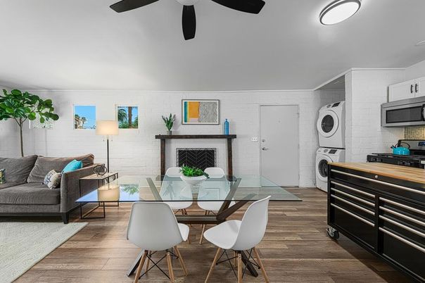 Dining room, Fireplace, Interior, Kitchen, Living room, Washer, Wood Texture Flooring