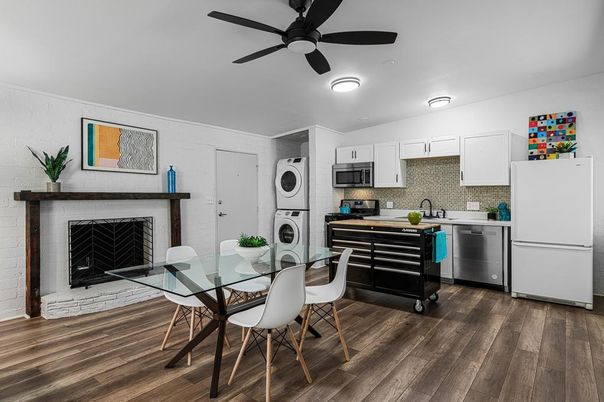 Dining room, Fireplace, Interior, Kitchen, Stainless Steel Appliances, Wood Texture Flooring