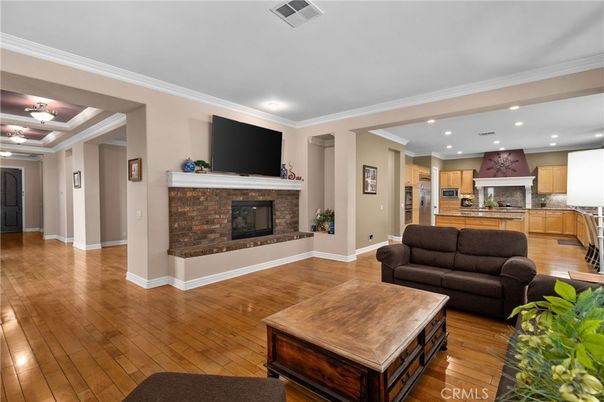 Fireplace, Interior, Kitchen, Living room, Recessed Lighting, Stainless Steel Appliances, Wood Texture Flooring