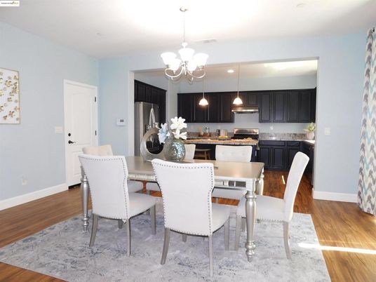 Chandelier, Dining room, Interior, Kitchen, Pendant Lights, Recessed Lighting, Stainless Steel Appliances, Wood Texture Flooring