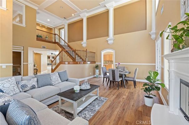 Dining room, Fireplace, Interior, Living room, Recessed Lighting, Wood Texture Flooring