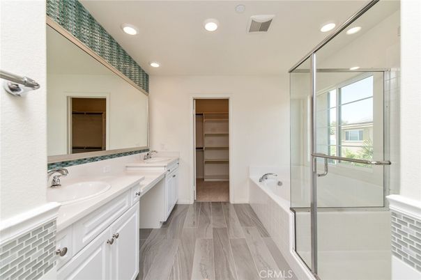 Bathroom, Dual Sink Vanities, Glass Shower, Interior, Recessed Lighting, Wood Texture Flooring