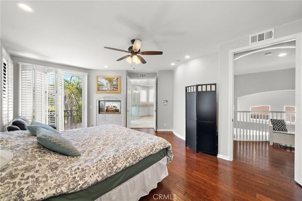 Bedroom, Fireplace, Interior, Recessed Lighting, Wood Texture Flooring