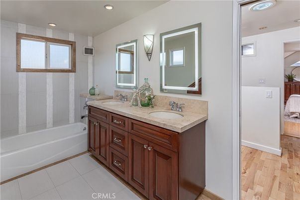 Bathroom, Dual Sink Vanities, Interior, Recessed Lighting, Wood Texture Flooring