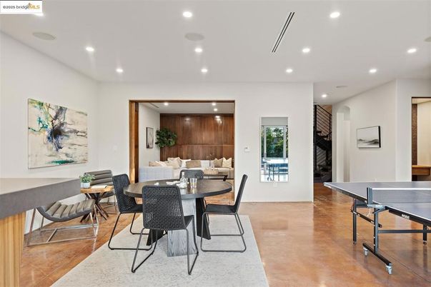 Dining room, Game Room, Interior, Recessed Lighting, Wood Texture Flooring, Wooden Walls