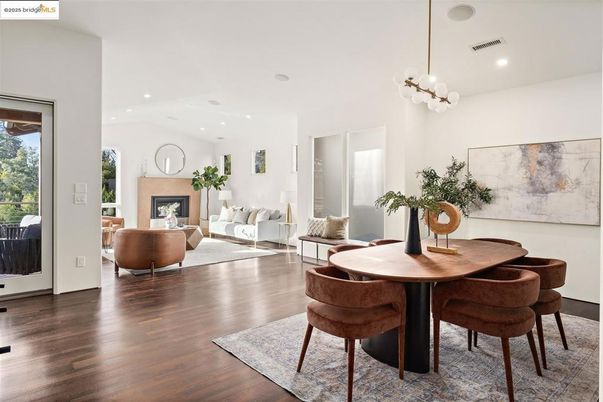 Dining room, Fireplace, Interior, Living room, Pendant Lights, Recessed Lighting, Wood Texture Flooring
