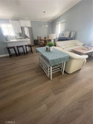 Dining room, Interior, Kitchen, Living room, Pendant Lights, Stainless Steel Appliances, Wood Texture Flooring