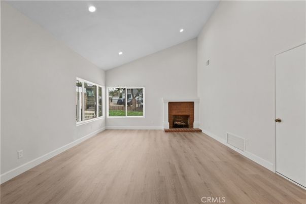 Empty room, Fireplace, Interior, Recessed Lighting, Wood Texture Flooring