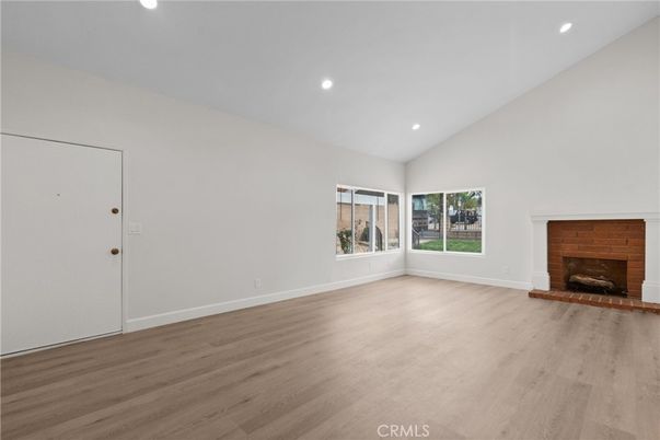 Empty room, Fireplace, Interior, Recessed Lighting, Wood Texture Flooring