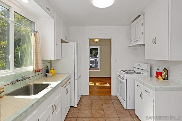 Interior, Kitchen, Tile Countertops, Wood Texture Flooring