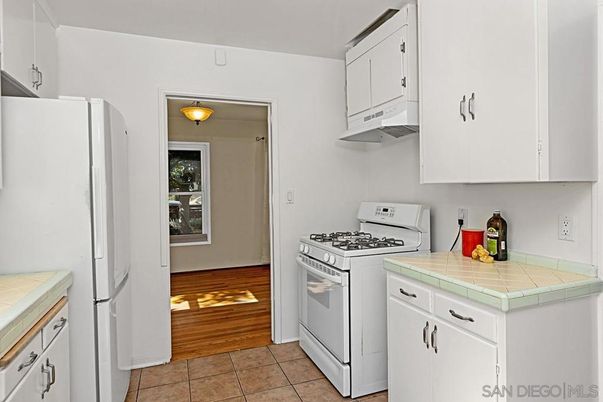 Interior, Kitchen, Tile Countertops, Wood Texture Flooring