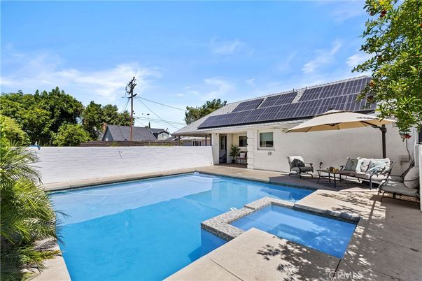 Exterior, Pool, Solar Panels