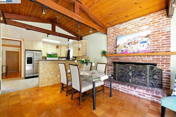 Dining room, Fireplace, Interior, Kitchen, Pendant Lights, Stainless Steel Appliances, Stone Walls, Wooden Beams, Wooden Ceilings, Wood Texture Flooring