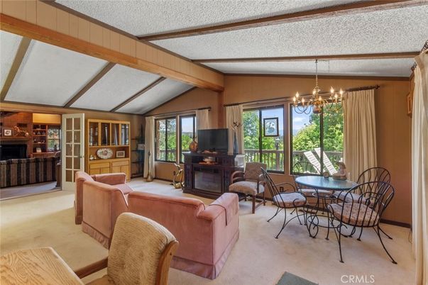 Chandelier, Dining room, Fireplace, Interior, Living room, Wooden Beams