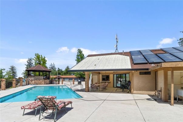 Exterior, Pool, Solar Panels