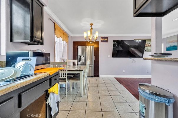 Chandelier, Dining room, Interior, Kitchen, Stainless Steel Appliances, Wood Texture Flooring