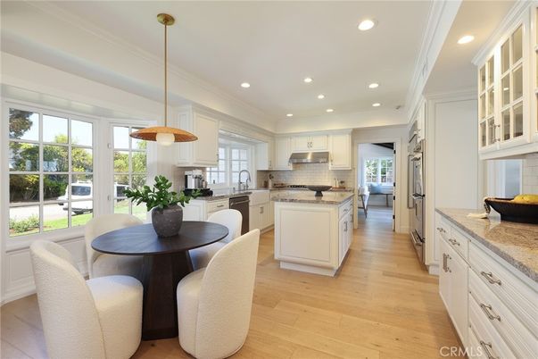 Dining room, Interior, Kitchen, Pendant Lights, Recessed Lighting, Stainless Steel Appliances, Wood Texture Flooring