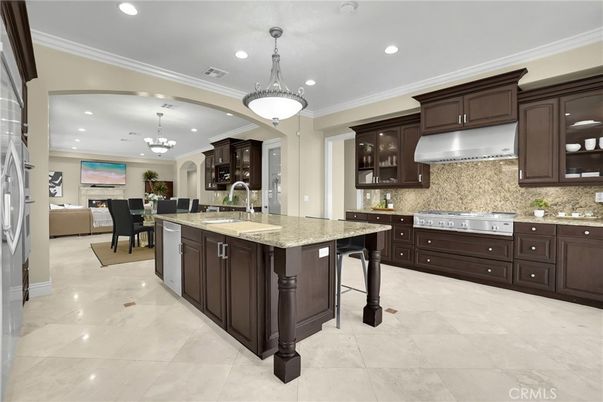 Chandelier, Dining room, Interior, Kitchen, Living room, Pendant Lights, Recessed Lighting, Stainless Steel Appliances