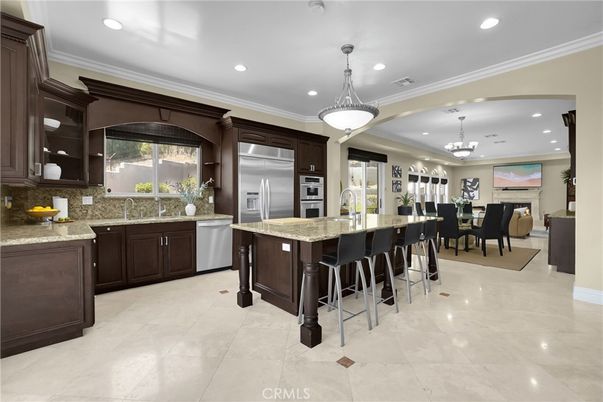 Chandelier, Dining room, Interior, Kitchen, Pendant Lights, Recessed Lighting, Stainless Steel Appliances