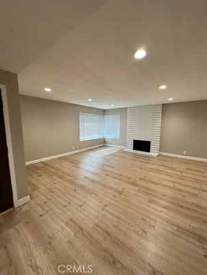 Empty room, Fireplace, Interior, Recessed Lighting, Wood Texture Flooring