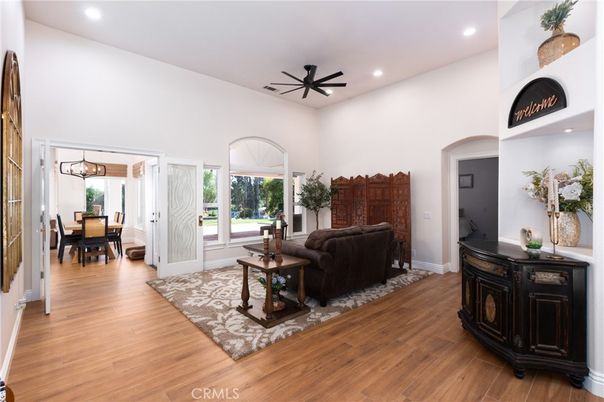 Dining room, Fireplace, Interior, Living room, Pendant Lights, Recessed Lighting, Wood Texture Flooring