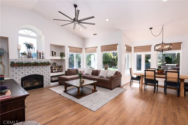 Chandelier, Dining room, Fireplace, Interior, Living room, Recessed Lighting, Wood Texture Flooring