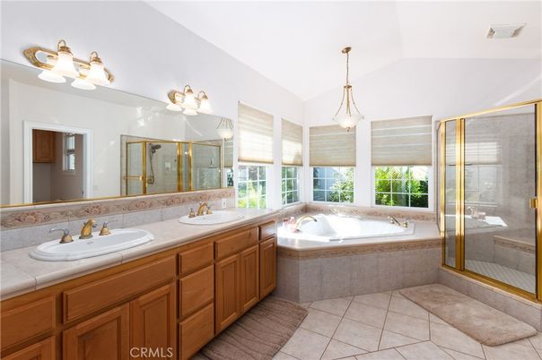 Bathroom, Dual Sink Vanities, Glass Shower, Interior, Pendant Lights, Tile Countertops