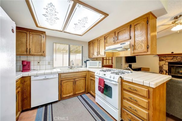 Fireplace, Interior, Kitchen, Tile Countertops