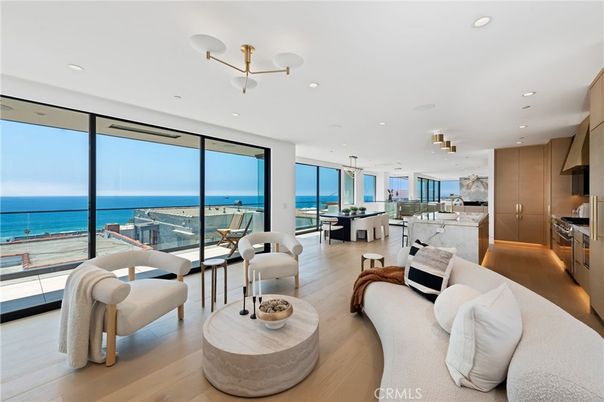 Dining room, Interior, Kitchen, Living room, Pendant Lights, Recessed Lighting, Stainless Steel Appliances, Water, Wood Texture Flooring
