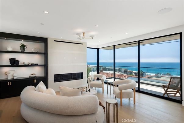 Fireplace, Interior, Living room, Recessed Lighting, Water, Wood Texture Flooring