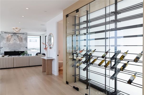 Fireplace, Interior, Living room, Recessed Lighting, Wine Storage, Wood Texture Flooring