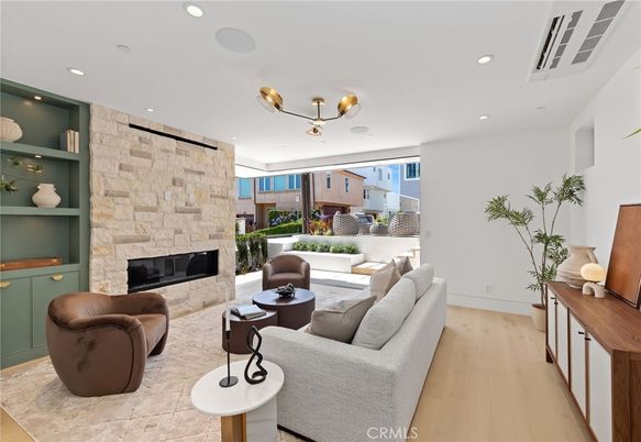 Fireplace, Interior, Living room, Recessed Lighting, Stone Walls, Wood Texture Flooring