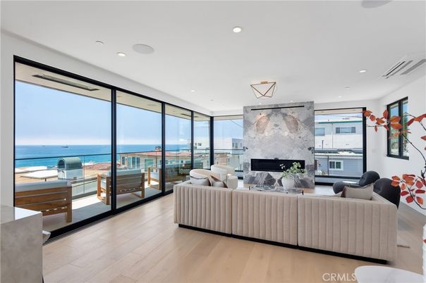 Fireplace, Interior, Living room, Marble Walls, Pendant Lights, Recessed Lighting, Water, Wood Texture Flooring
