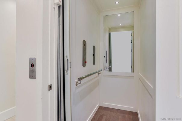 Elevator, Interior, Recessed Lighting, Wood Texture Flooring