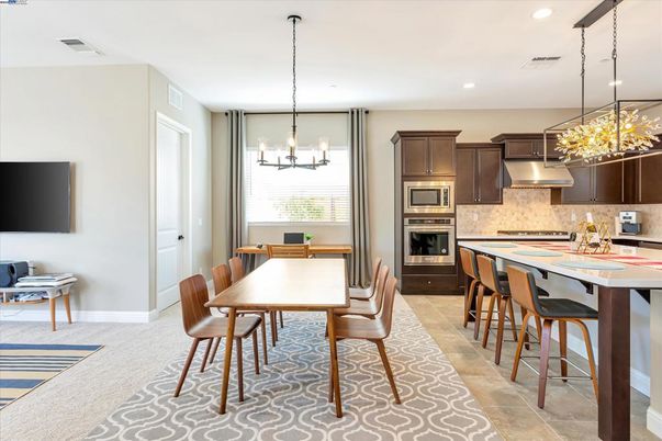 Chandelier, Dining room, Interior, Kitchen, Pendant Lights, Recessed Lighting, Stainless Steel Appliances