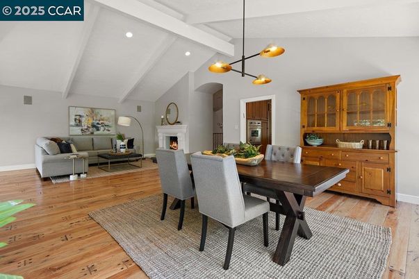 Dining room, Fireplace, Interior, Living room, Pendant Lights, Recessed Lighting, Wood Texture Flooring