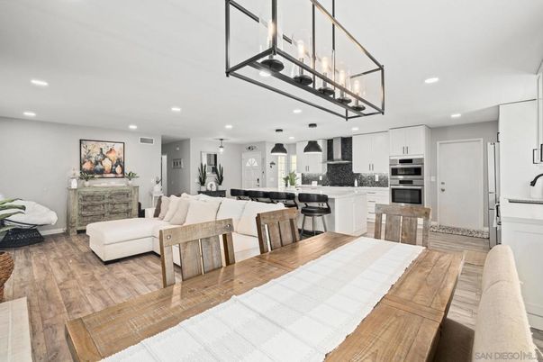 Dining room, Interior, Kitchen, Living room, Pendant Lights, Recessed Lighting, Stainless Steel Appliances, Wood Texture Flooring