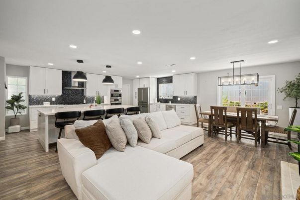 Dining room, Interior, Kitchen, Living room, Pendant Lights, Recessed Lighting, Stainless Steel Appliances, Wood Texture Flooring
